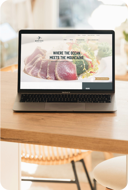 Laptop with Montauk Website displayed
