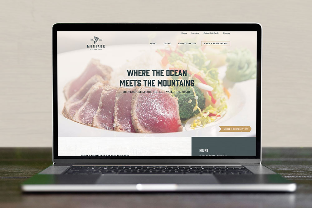 Montauk Seafood Grill website on a laptop