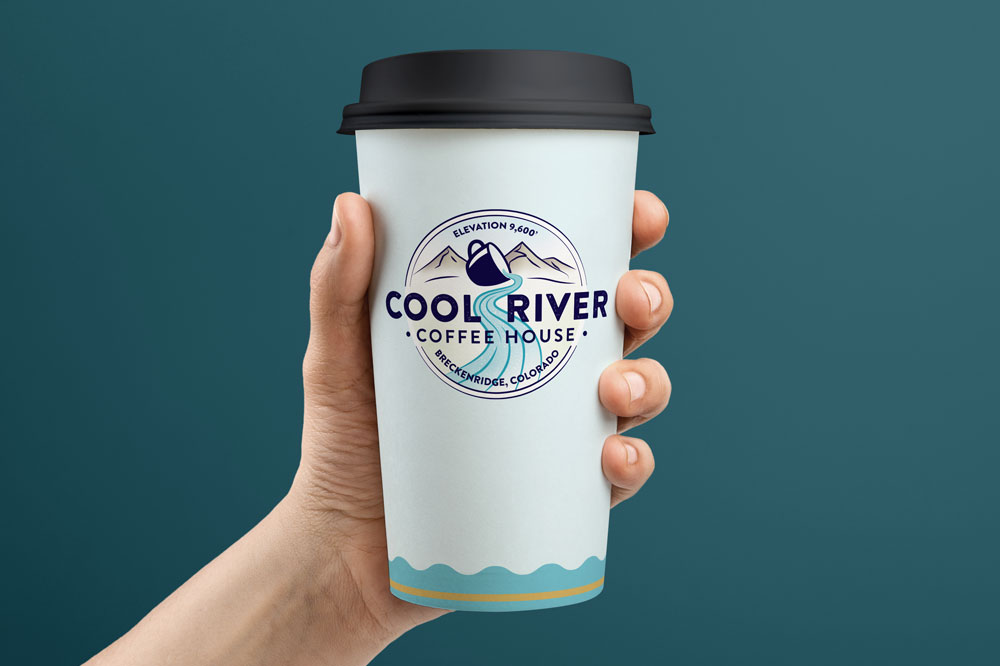 Cool River Coffee House logo on a coffee cup