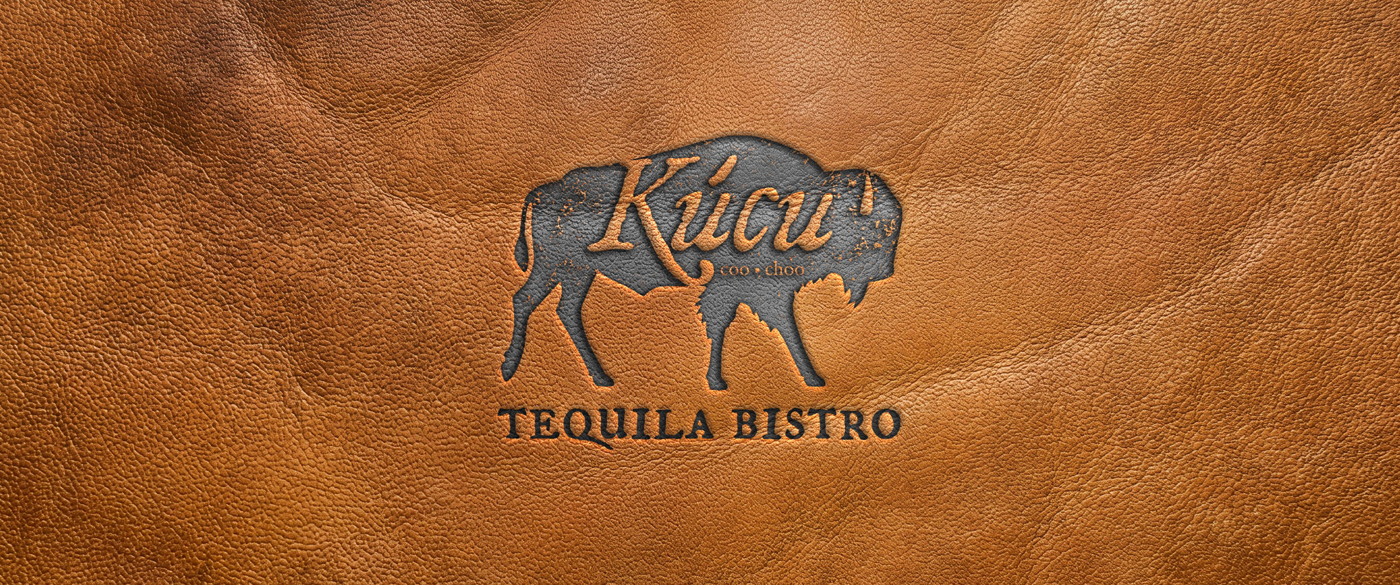 Kúcu Tequila Bistro logo burned onto leather